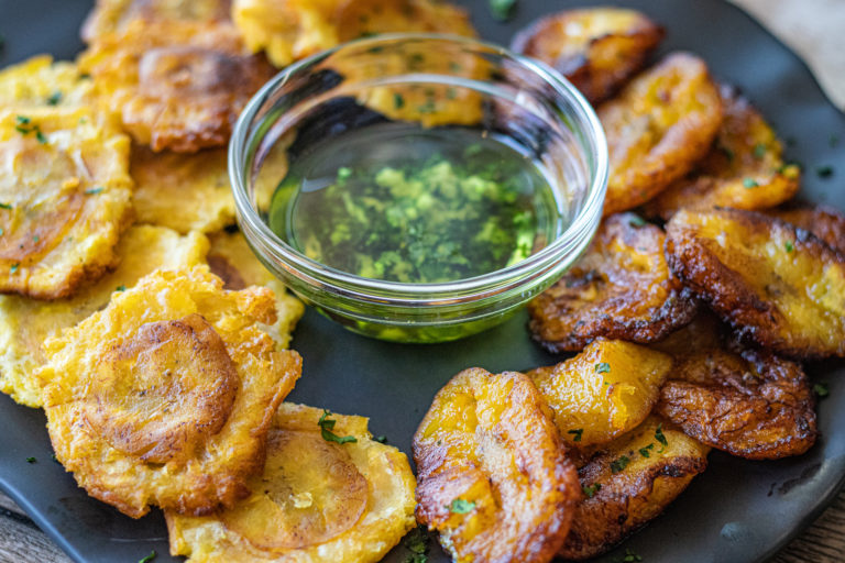 Traditional Dominican Green and Yellow Fried Plantains with Mojo Sauce