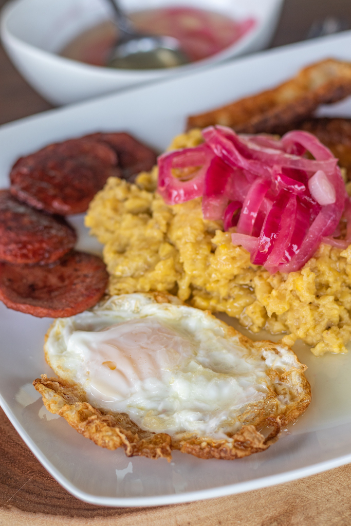 dominican mangú tres golpes salami, eggs, cheese
