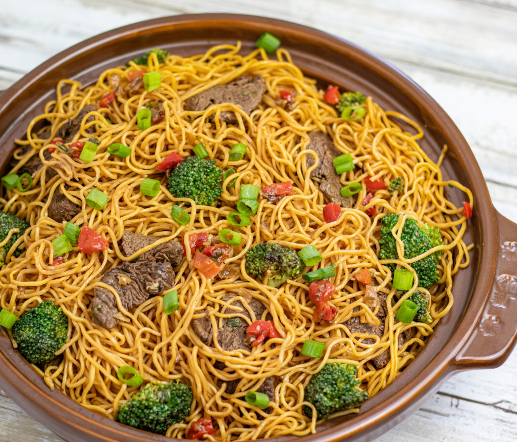 beef lo mein in a large serving dish