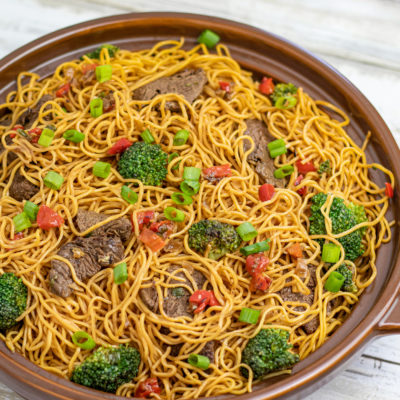 beef lo mein in a large serving dish