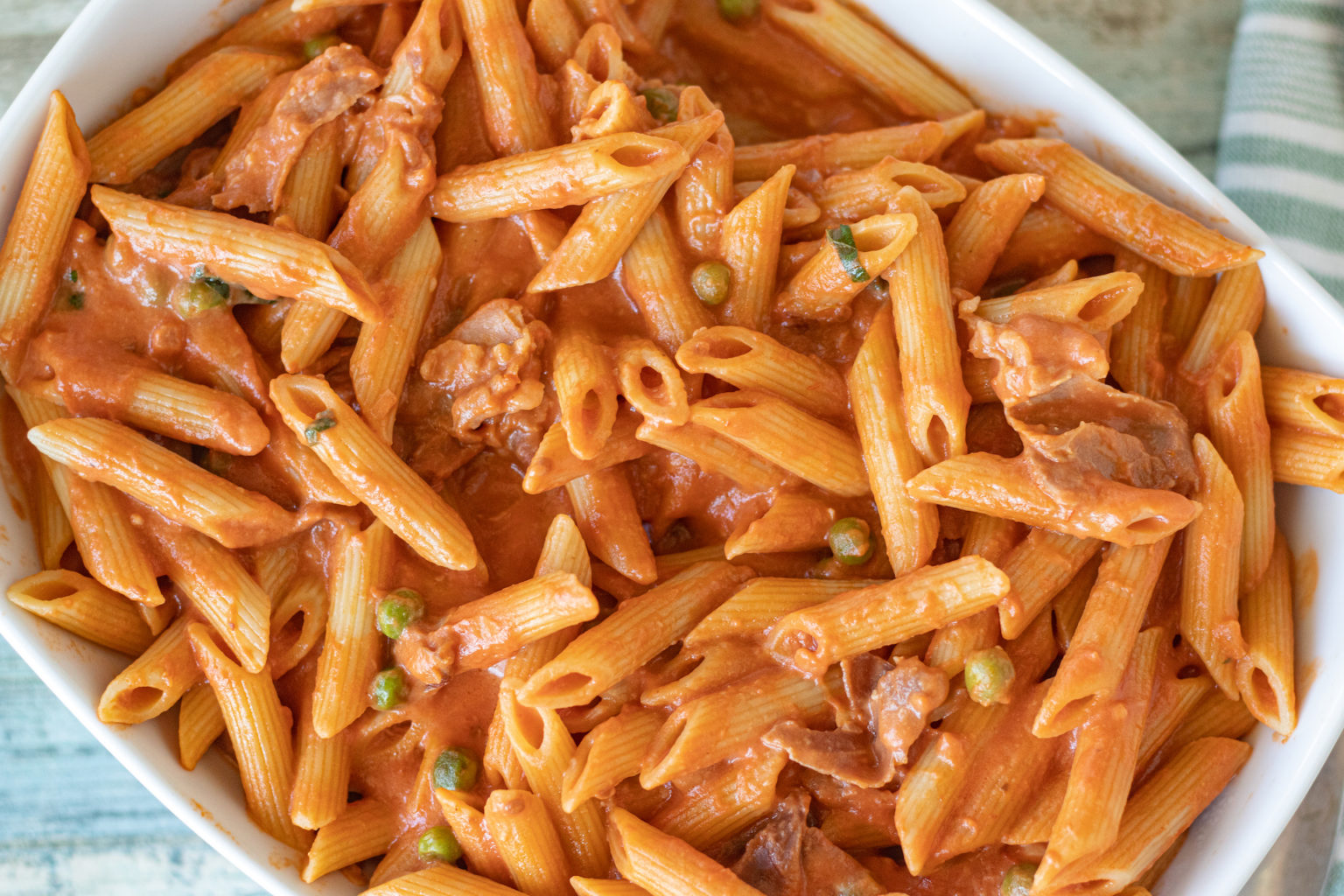 Penne Alla Vodka with Prosciutto and Peas Belqui's Twist