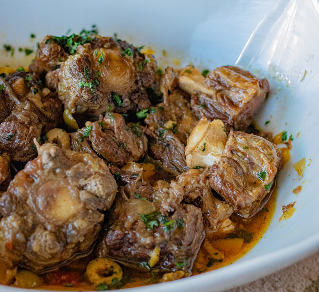 Instant Pot Oxtail Stew, Rabo Encendido, in a serving bowl. Close up. Tender as can be. A must try!