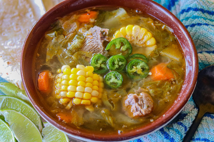 A bowl of Mexican beef soup or as called in spanish, Caldo de res. A super healthy and hearty soup perfect to warm you up on a cold day.