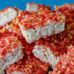 Flamin' Hot Krispy Treats one over the other on a serving platter