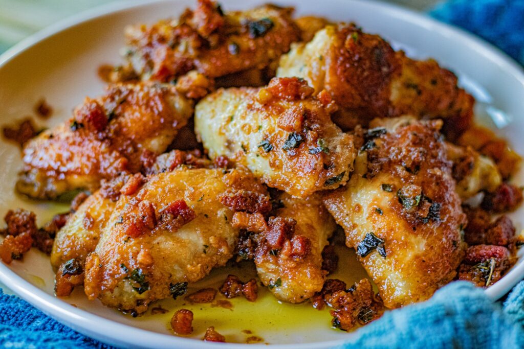 Chicken Marsala Wings with Pancetta. You can see the bits of pancetta over the wings as well. Delicious!